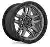 FUEL | D701 أمو | 17×9 6X5.5 إزاحة 1مم | رمادي مطفي / أسود مع حلقة حبيبات